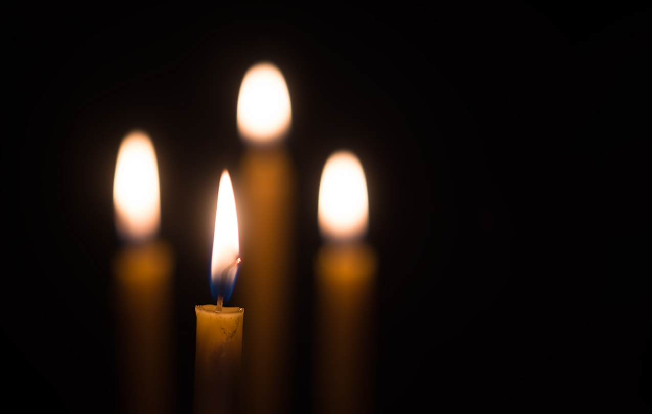 Candles in dark room